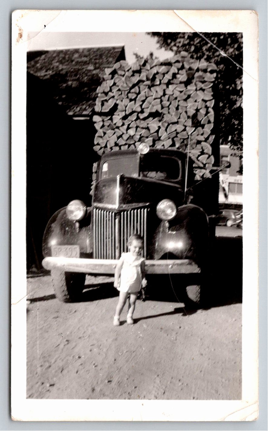 Vintage 1940s Snapshot: Toddler & Loaded 1940 Ford Truck